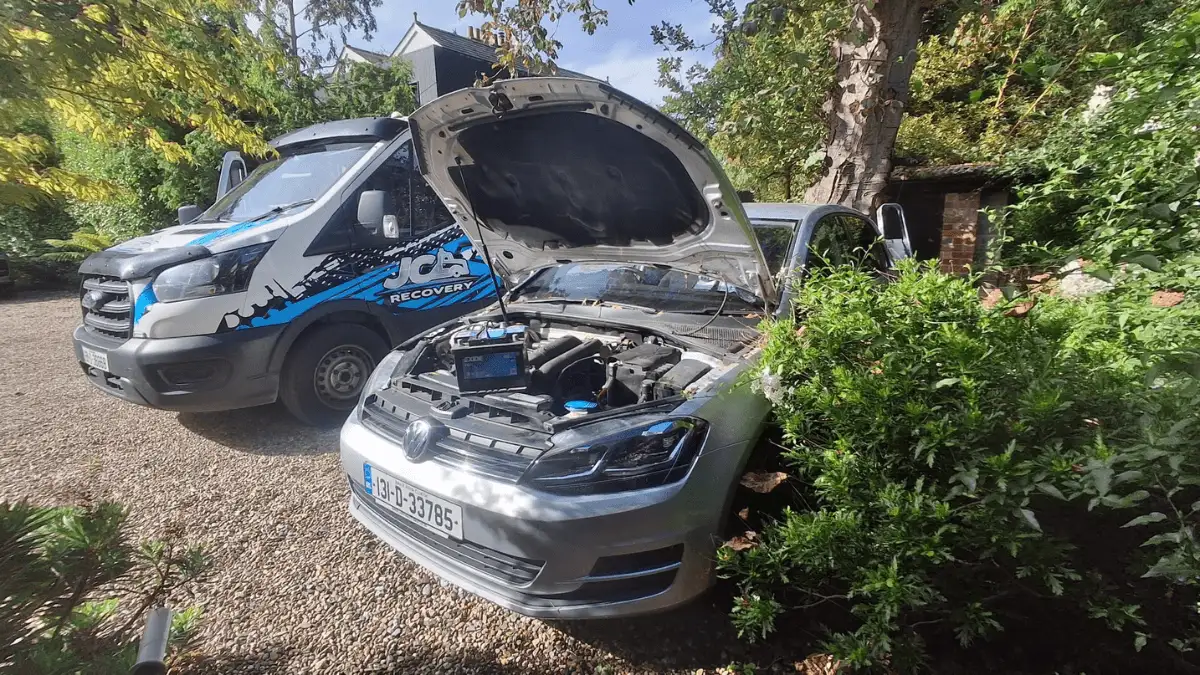 JC Recovery providing mobile car battery replacement at a customer's home in Dublin